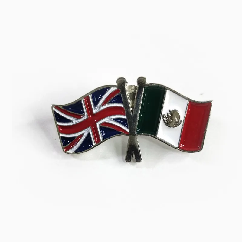 Pin de banderas cruzadas de la amistad en níquel y esmalte, con las banderas del Reino Unido y México.